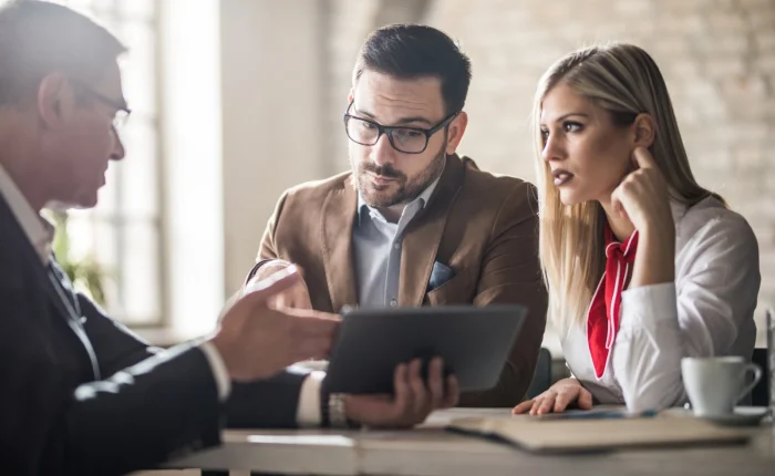 couple-looking-at-ipad
